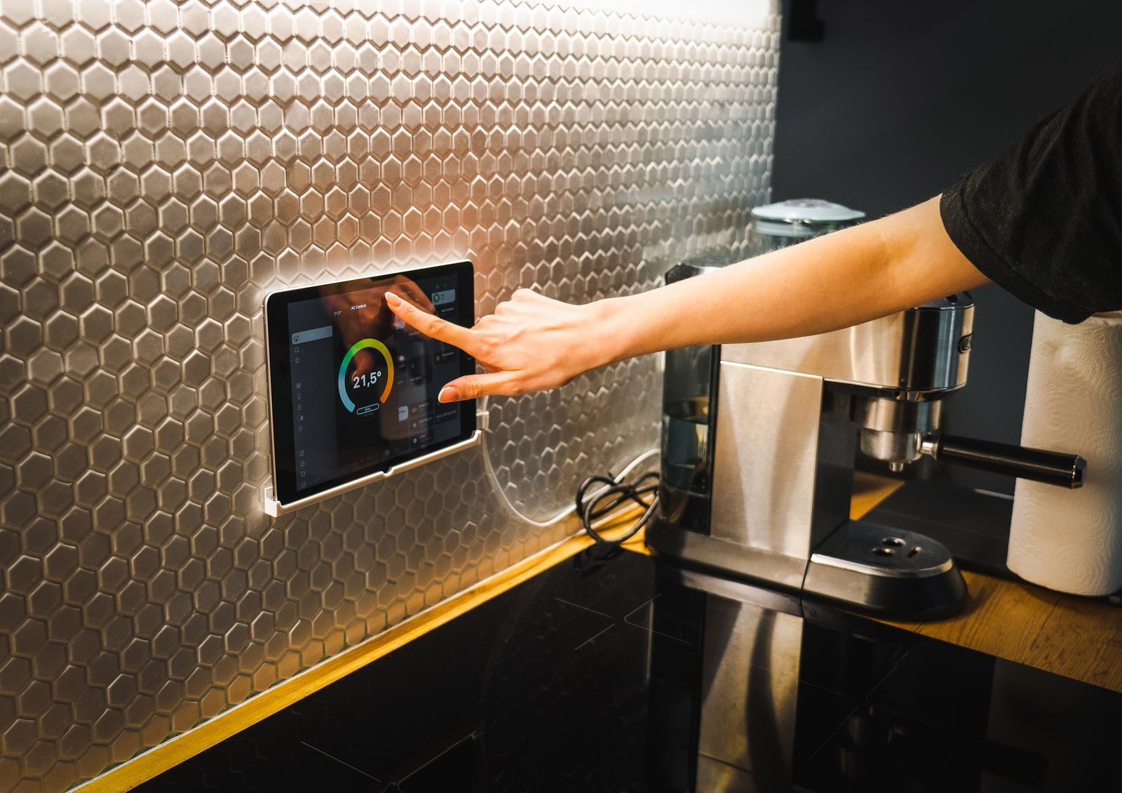 Technician setting up a smart home system on a tablet